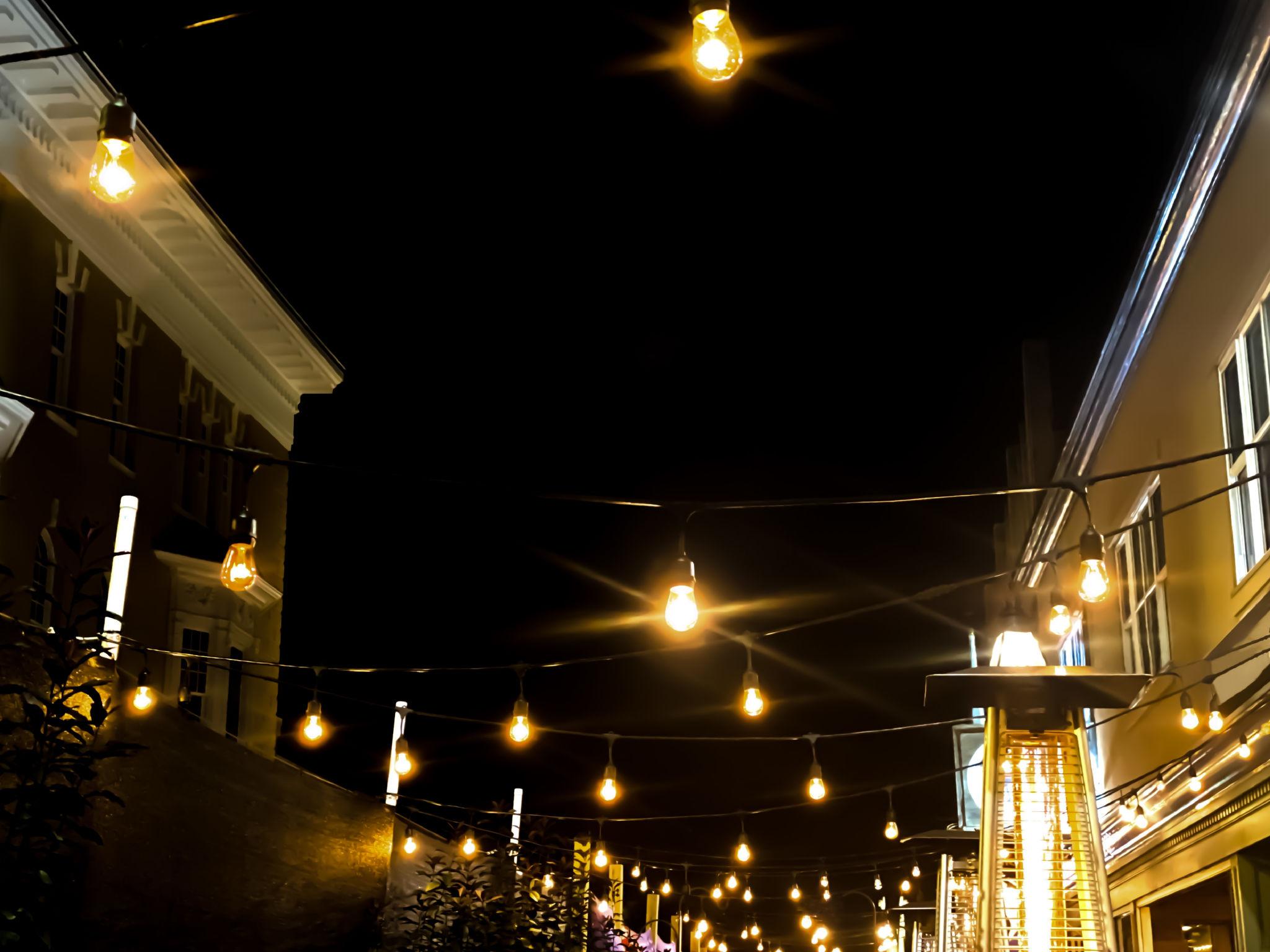 South Austin entertainment district glowing under string lights at night